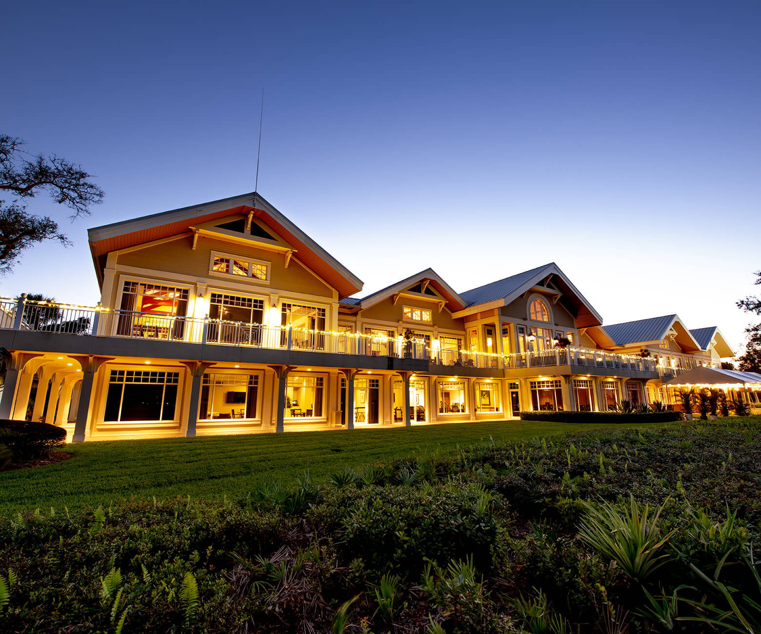 Clubhouse at disk illuminated by exterior lights