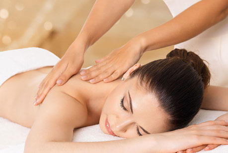 Woman getting a massage at the Harbour Ridge Spa & Salon