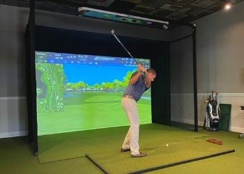 An Insider’s Look at The Eagle’s Bay Indoor Golf Simulator Harbour Ridge style=