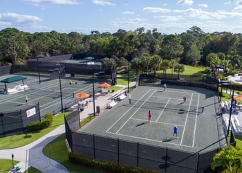 Find Out Why Tennis at Private Clubs is Gaining Popularity Harbour Ridge style=