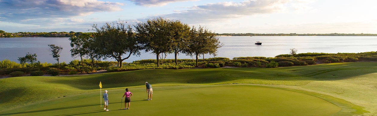 harbour ridge members playing on the waterfront golf course living the Florida Golf Club Lifestyle